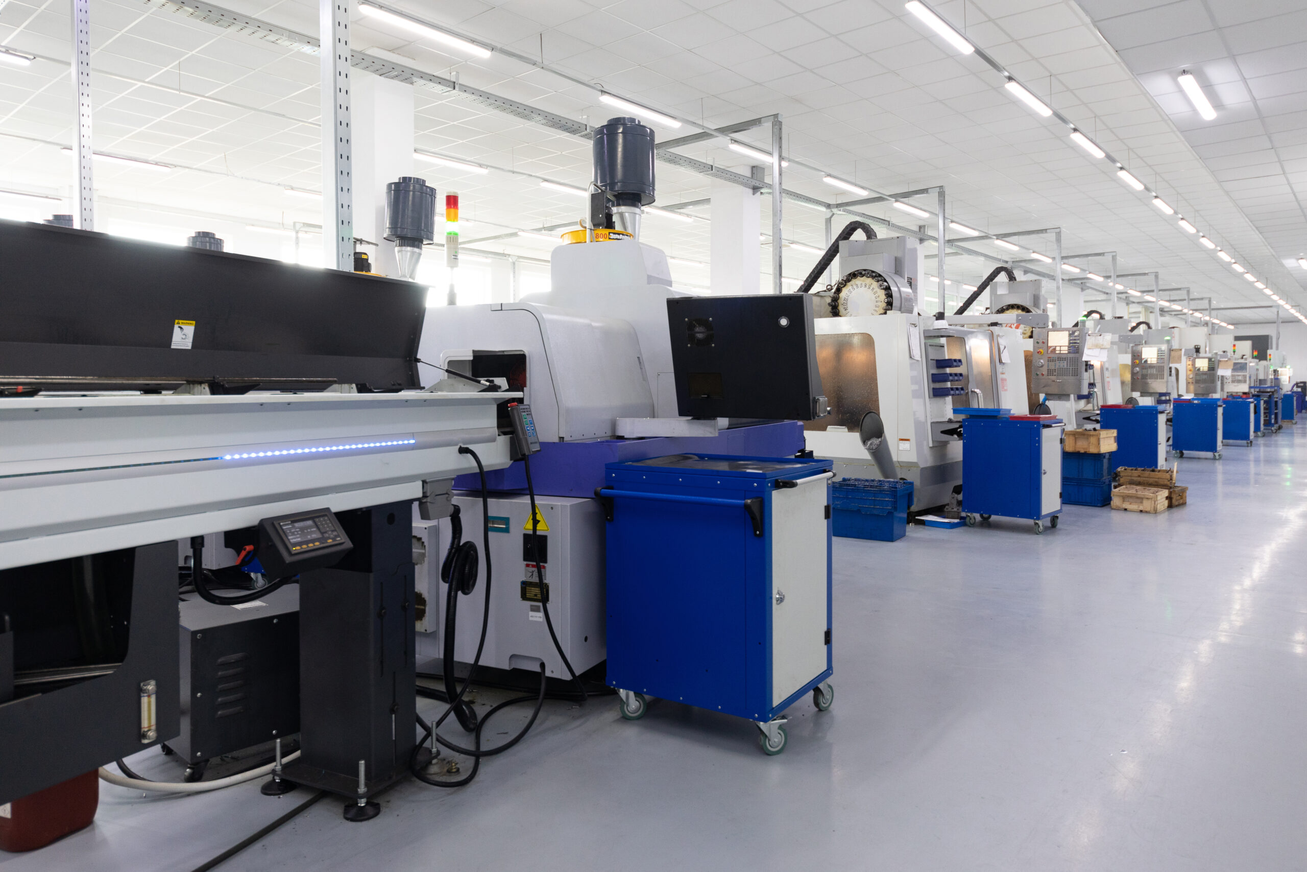 Home an interior shot of producing line of metal parts in modern plant